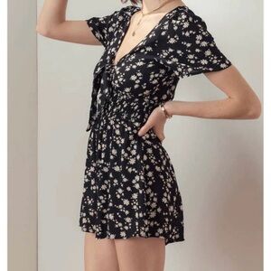 Love Tree Black romper with White Floral Design